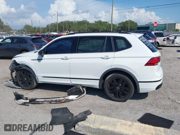 2022 Volkswagen Tiguan SE R-Line Black with VIN 3VVCB7AX5NM009696, listed as a IAAI auction lot 42364884 with 45,380 mi miles and . Bid and sale history available at DreamBid. Image 13.