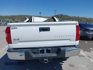 2014 Toyota Tundra 4WD Truck SR5 with VIN 5TFDW5F1XEX390763, listed as a IAAI auction lot 41973864 with 117,369 mi miles. Bid and sale history available at carsss.com. Image 16.
