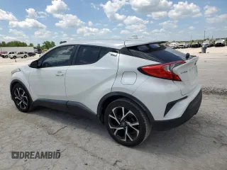 2018 Toyota C-HR XLE z VIN NMTKHMBX7JR035814, wystawiony jako Copart lot #56830125 z przebiegiem 106 843 mil mil oraz Czysty tytuł • Clean title. Historia ofert i sprzedaży dostępna na DreamBid. Obrazek 2.