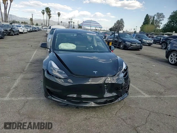 2023 Tesla Model 3 z VIN 5YJ3E1EA3PF713735, wystawiony jako Copart lot #51821995 z przebiegiem Nie podano mil oraz Szkoda całkowita • Salvage title. Historia ofert i sprzedaży dostępna na DreamBid. Obrazek 11.
