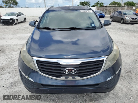 2012 Kia Sportage LX z VIN KNDPB3A29C7240993, wystawiony jako Copart lot #61408165 z przebiegiem 171 453 mil mil oraz Czysty tytuł • Clean title. Historia ofert i sprzedaży dostępna na DreamBid. Obrazek 5.
