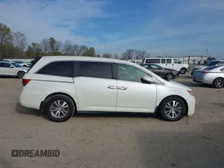 2016 Honda Odyssey EX-L z VIN 5FNRL5H60GB011001, wystawiony jako IAAI lot #41897958 z przebiegiem 126 133 mil mil oraz . Historia ofert i sprzedaży dostępna na DreamBid. Obrazek 13.