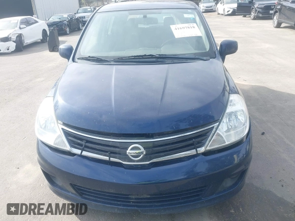 2012 Nissan Versa S with VIN 3N1BC1CPXCK250182, listed as a IAAI auction lot 41697818 with 122,450 mi miles. Bid and sale history available at carsss.com. Image 6.