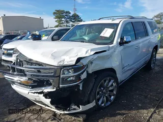 2017 Chevrolet Suburban Premier z VIN 1GNSKJKC9HR117378, wystawiony jako IAAI lot #41610682 z przebiegiem Nie podano mil oraz . Historia ofert i sprzedaży dostępna na DreamBid. Obrazek 17.