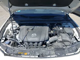 2021 Mazda 3 with VIN JM1BPBDL6M1340029, listed as a IAAI auction lot 42461850 with 79,798 mi miles and . Bid and sale history available at DreamBid. Image 10.