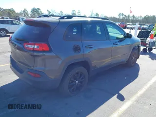 2014 Jeep Cherokee Latitude with VIN 1C4PJMCS3EW298340, listed as a IAAI auction lot 41708488 with 217,438 mi miles and . Bid and sale history available at DreamBid. Image 4.