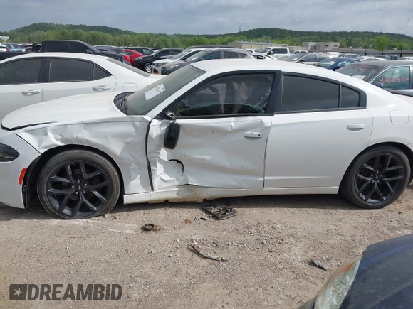 2019 Dodge Charger SXT with VIN 2C3CDXBG6KH670806, listed as a IAAI auction lot 42051415 with 112,144 mi miles and . Bid and sale history available at DreamBid. Image 14.