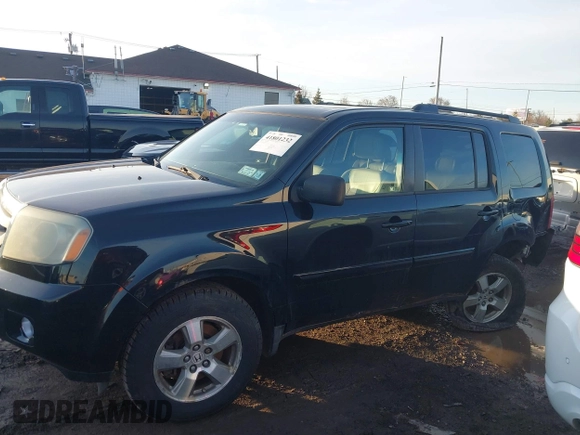 2009 Honda Pilot EX-L with VIN 5FNYF48659B012032, listed as a IAAI auction lot 41801232 with 205,636 mi miles and . Bid and sale history available at carsss.com. Image 14.