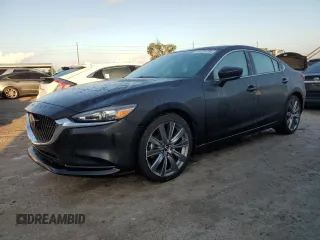 2021 Mazda 6 Touring with VIN JM1GL1VM7M1614986, listed as a Copart auction lot 73731794 with Not Provided miles and Salvage Title. Bid and sale history available at DreamBid. Image 1.