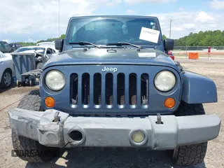 2007 Jeep Wrangler Unlimited Sahara with VIN 1J4GA59117L216687, listed as a IAAI auction lot 42188257 with 176,507 mi miles and . Bid and sale history available at DreamBid. Image 13.