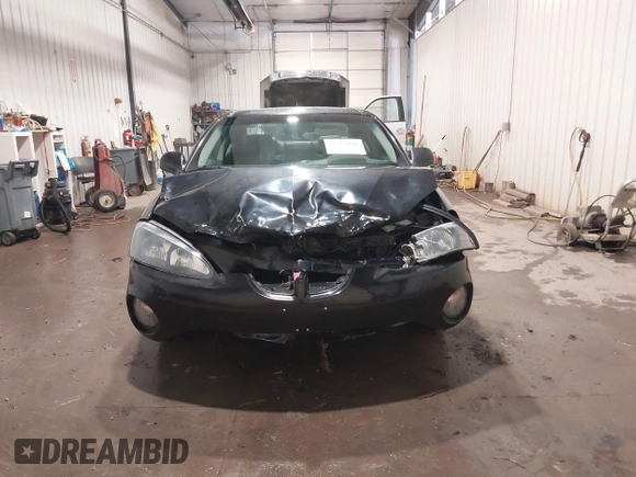 2006 Pontiac Grand Prix z VIN 2G2WP552861212532, wystawiony jako IAAI lot #42212046 z przebiegiem 171 326 mil mil oraz . Historia ofert i sprzedaży dostępna na DreamBid. Obrazek 13.
