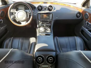 2015 Jaguar XJ with VIN SAJWA2GZ4F8V90853, listed as a Copart auction lot 72631114 with 59,237 mi miles and Salvage Title. Bid and sale history available at carsss.com. Image 8.