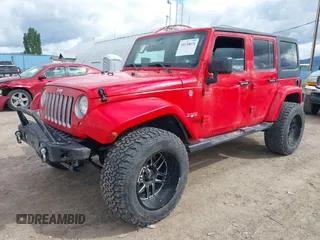 2018 Jeep Wrangler JK Unlimited Sahara with VIN 1C4HJWEG3JL893970, listed as a IAAI auction lot 39530074 with 72,079 mi miles. Bid and sale history available at carsss.com. Image 6.