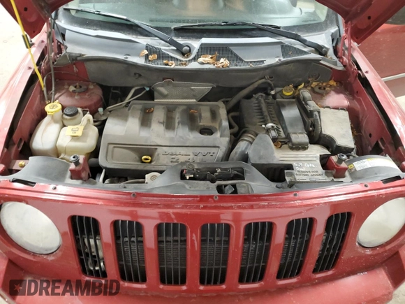 2010 Jeep Patriot Sport z VIN 1J4NF1GB5AD620526, wystawiony jako Copart lot #89088465 z przebiegiem 131 288 mil mil oraz Szkoda całkowita • Salvage title. Historia ofert i sprzedaży dostępna na DreamBid. Obrazek 12.