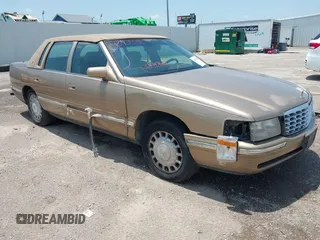 1999 Cadillac DeVille z VIN 1G6KD54Y2XU788781, wystawiony jako IAAI lot #42390531 z przebiegiem 180 328 mil mil oraz . Historia ofert i sprzedaży dostępna na DreamBid. Obrazek 6.