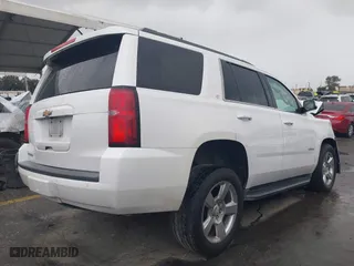 2018 Chevrolet Tahoe LT with VIN 1GNSKBKC7JR351112, listed as a IAAI auction lot 41732631 with 103,771 mi miles. Bid and sale history available at carsss.com. Image 4.