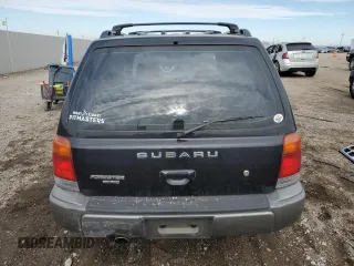 1999 Subaru Forester S with VIN JF1SF6550XH735142, listed as a Copart auction lot 85818264 with 0 mi miles and Salvage Title. Bid and sale history available at carsss.com. Image 6.