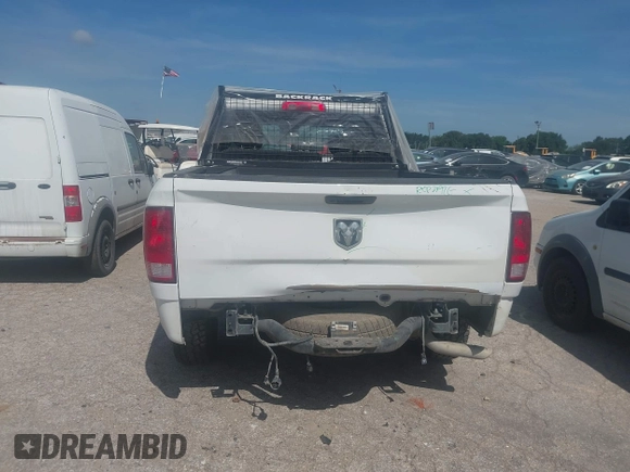 2021 Ram 1500 Tradesman with VIN 1C6RR6FG0MS524674, listed as a IAAI auction lot 42589113 with 95,899 mi miles and . Bid and sale history available at DreamBid. Image 16.