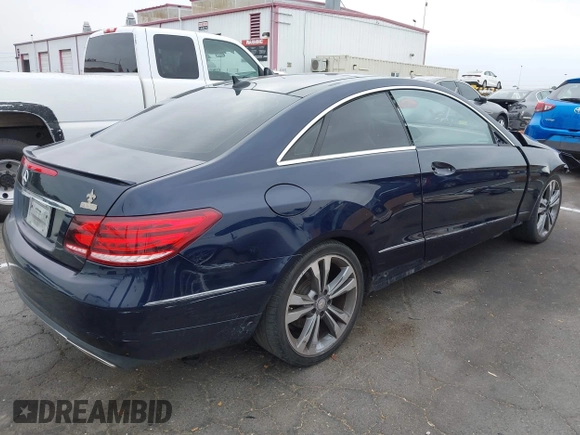 2014 Mercedes-Benz E 350 with VIN WDDKJ5KB7EF282343, listed as a IAAI auction lot 42597510 with 70,026 mi miles and . Bid and sale history available at DreamBid. Image 4.