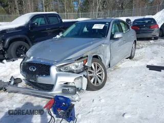 2015 Infiniti Q50 Premium z VIN JN1BV7ARXFM395132, wystawiony jako IAAI lot #41618895 z przebiegiem 96 951 mil mil oraz . Historia ofert i sprzedaży dostępna na DreamBid. Obrazek 2.