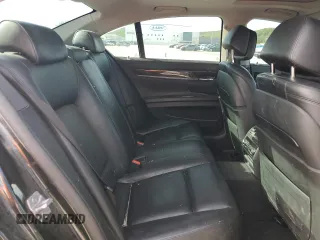 2013 BMW 7 Series 750i xDrive z VIN WBAYB6C50DD223559, wystawiony jako Copart lot #54000435 z przebiegiem 265 821 mil mil oraz Czysty tytuł • Clean title. Historia ofert i sprzedaży dostępna na DreamBid. Obrazek 10.