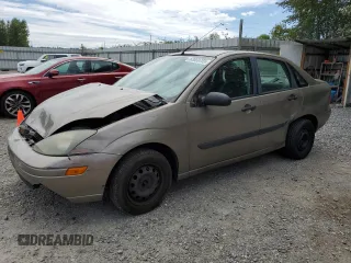 2004 Ford Focus LX with VIN 1FAFP33P24W148563, listed as a Copart auction lot 63869755 with 142,243 mi miles and Salvage title. Bid and sale history available at DreamBid. Image 1.
