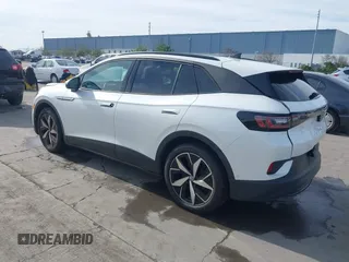 2023 Volkswagen ID.4 S z VIN 1V25MPE80PC043892, wystawiony jako IAAI lot #41669315 z przebiegiem 49 976 mil mil oraz . Historia ofert i sprzedaży dostępna na DreamBid. Obrazek 3.