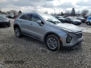 2024 Cadillac XT4 AWD Premium Luxury with VIN 1GYFZDR40RF123637, listed as a Copart auction lot 46852195 with 5,001 mi miles and Salvage title. Bid and sale history available at DreamBid. Image 4.