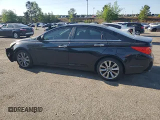 2012 Hyundai Sonata Limited z VIN 5NPEC4AC4CH429064, wystawiony jako Copart lot #53499355 z przebiegiem 203 928 mil mil oraz Szkoda całkowita • Salvage title. Historia ofert i sprzedaży dostępna na DreamBid. Obrazek 2.