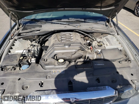 2005 Jaguar XJ with VIN SAJWA79C15SG40523, listed as a Copart auction lot 77994844 with 113,634 mi miles and Clean Title. Bid and sale history available at carsss.com. Image 11.