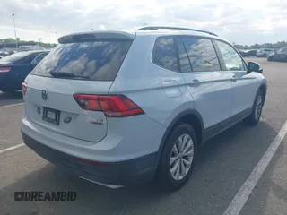 2018 Volkswagen Tiguan S with VIN 3VV0B7AX5JM025815, listed as a IAAI auction lot 42219906 with 168,122 mi miles and . Bid and sale history available at DreamBid. Image 4.