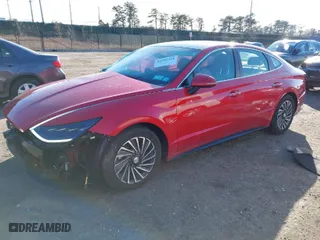 2021 Hyundai Sonata Hybrid Limited with VIN KMHL54JJ5MA033732, listed as a IAAI auction lot 41592334 with 30,911 mi miles. Bid and sale history available at carsss.com. Image 2.
