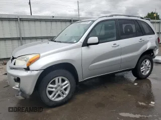 2002 Toyota RAV4 with VIN JTEGH20VX26010352, listed as a Copart auction lot 58983385 with 219,190 mi miles and Salvage title. Bid and sale history available at DreamBid. Image 1.