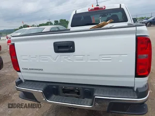 2021 Chevrolet Colorado 2WD Work Truck z VIN 1GCHSBEA6M1105491, wystawiony jako IAAI lot #42273668 z przebiegiem 43 024 mil mil oraz . Historia ofert i sprzedaży dostępna na DreamBid. Obrazek 16.