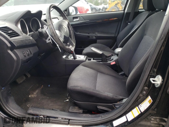 2015 Mitsubishi Lancer GT with VIN JA32U8FW6FU017585, listed as a Copart auction lot 68391044 with 110,521 mi miles and Salvage Title. Bid and sale history available at carsss.com. Image 7.