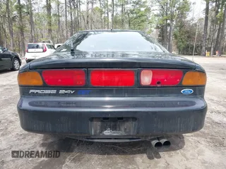 1995 Ford Probe z VIN 1ZVLT22B1S5104093, wystawiony jako IAAI lot #41744654 z przebiegiem 166 253 mil mil oraz . Historia ofert i sprzedaży dostępna na DreamBid. Obrazek 16.