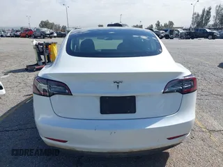 2023 Tesla Model 3 with VIN 5YJ3E1EA8PF398110, listed as a IAAI auction lot 41692006 with 112,699 mi miles and . Bid and sale history available at carsss.com. Image 16.