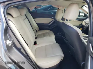 2014 Mazda 6 i Grand Touring с VIN JM1GJ1W67E1135264, выставлен на аукционе Copart как лот 70587624 с пробегом 86 926 миль миль и Списание • Salvage title. История ставок и продаж доступна на DreamBid. Изображение 10.