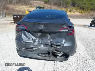 2023 Tesla Model Y Long Range with VIN 7SAYGAEE7PF971620, listed as a IAAI auction lot 41654688 with Not Provided miles and . Bid and sale history available at DreamBid. Image 17.
