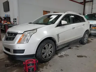 2011 Cadillac SRX Luxury Collection with VIN 3GYFNDEY1BS548452, listed as a IAAI auction lot 41476690 with 156,922 mi miles and . Bid and sale history available at carsss.com. Image 2.