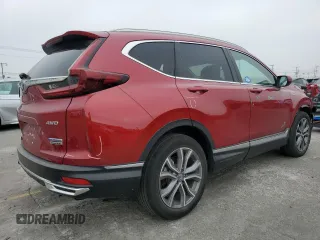 2021 Honda CR-V Touring z VIN 7FART6H96ME037070, wystawiony jako Copart lot #60664755 z przebiegiem 35 694 mil mil oraz Szkoda całkowita • Salvage title. Historia ofert i sprzedaży dostępna na DreamBid. Obrazek 3.