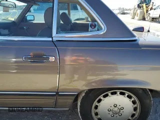 1987 Mercedes-Benz 560 with VIN WDBBA48D7HA063380, listed as a Copart auction lot 77820004 with 81,187 mi miles and Salvage Title. Bid and sale history available at carsss.com. Image 12.