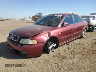 2000 Audi S4 z VIN WAUDD68DXYA127728, wystawiony jako Copart lot #75094394 z przebiegiem 164 612 mil mil oraz Szkody całkowita. Historia ofert i sprzedaży dostępna na DreamBid. Obrazek 1.