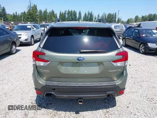 2021 Subaru Forester Premium with VIN JF2SKAFC5MH550118, listed as a IAAI auction lot 42427536 with 31,469 mi miles and . Bid and sale history available at DreamBid. Image 17.