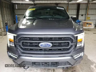 2021 Ford F-150 XL with VIN 1FTFW1E82MFA21318, listed as a Copart auction lot 54409795 with 74,977 mi miles and Salvage Title. Bid and sale history available at carsss.com. Image 5.