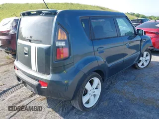 2010 Kia Soul + with VIN KNDJT2A23A7069815, listed as a IAAI auction lot 40173837 with 116,028 mi miles. Bid and sale history available at carsss.com. Image 4.