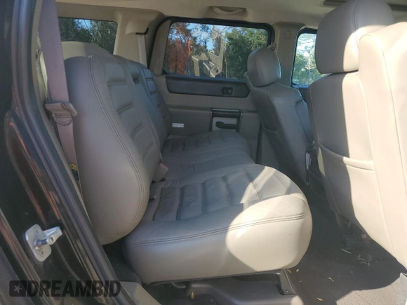 2003 Hummer H2 with VIN 5GRGN23UX3H136571, listed as a Copart auction lot 80823054 with 220,003 mi miles and Salvage Title. Bid and sale history available at carsss.com. Image 11.