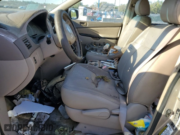 2005 Toyota Sienna CE с VIN 5TDZA23C05S337259, выставлен на аукционе Copart как лот 52256085 с пробегом Не указан миль и Списание • Salvage title. История ставок и продаж доступна на DreamBid. Изображение 7.