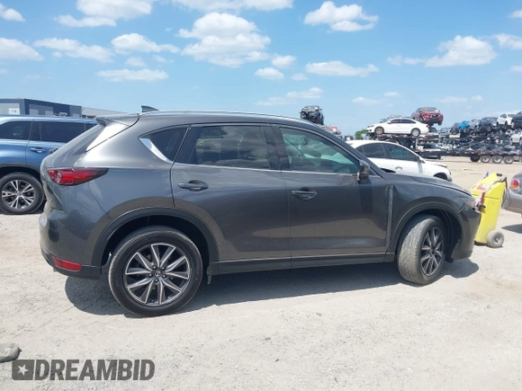 2017 Mazda CX-5 Grand Touring with VIN JM3KFADL3H0227655, listed as a IAAI auction lot 41897981 with 103,545 mi miles. Bid and sale history available at carsss.com. Image 13.