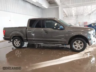 2015 Ford F-150 XL with VIN 1FTEW1CG2FKE36882, listed as a IAAI auction lot 41364096 with 143,167 mi miles. Bid and sale history available at carsss.com. Image 13.